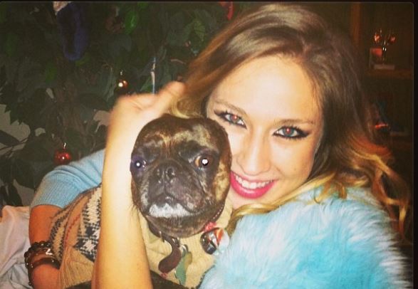 Amelia Babis Kelly with one of her dogs