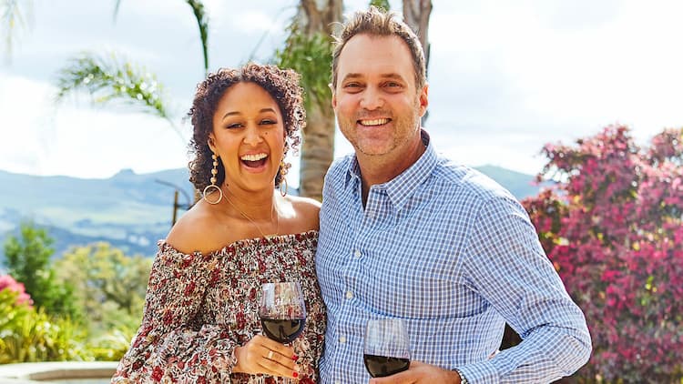 Adam Housley and His wife Tamera Mowry 