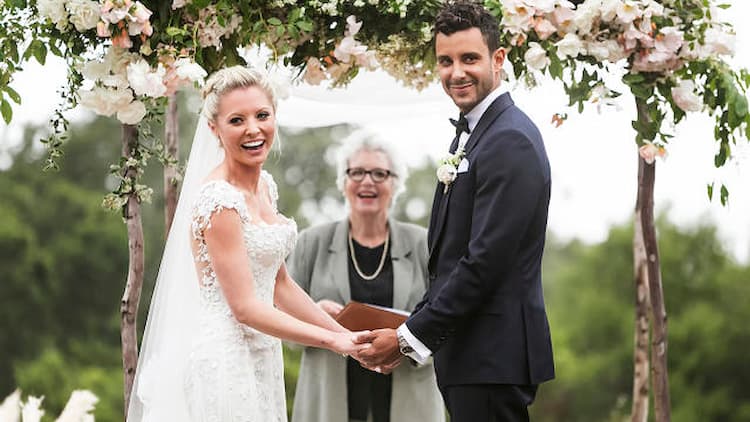 Kaitlin Doubleday together with her husband Devin Lucien on their wedding day