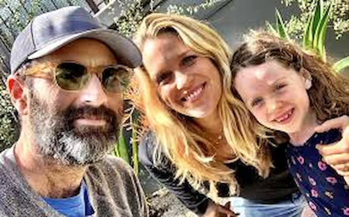 Jessica St. Clair together with her husband Dan O'Brien and their daughter