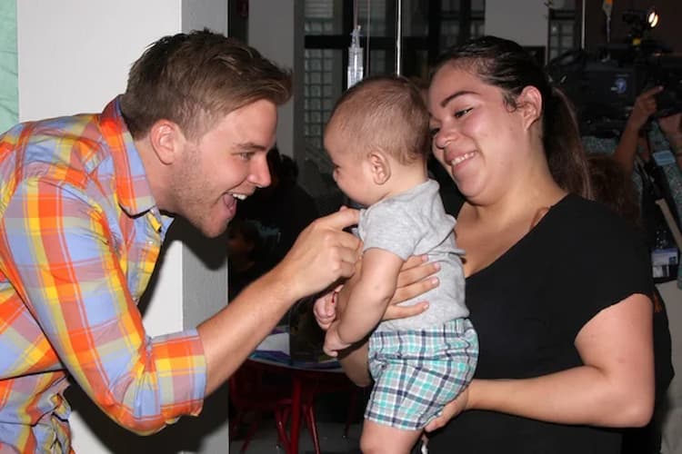 Marissa Jaret Winokur together with her husband Judah Miller and their son Zev Isaac Miller 