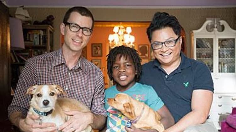 Alec Mapa together with his spouse Jamie Hebertand son