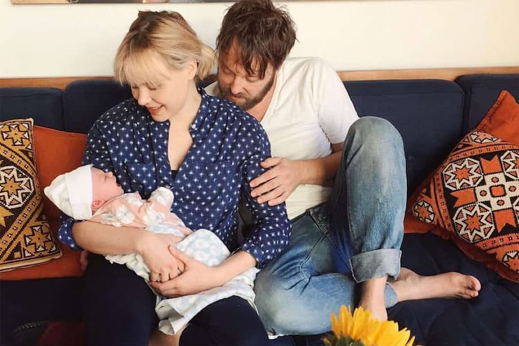 Alison Pill together with her husband Joshua Leonard and child