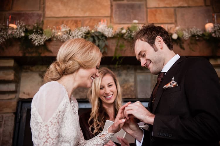 Claire Coffee with her husband Chris Thile exchanging vows