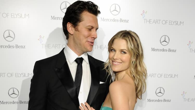 Hayes MacArthur together with his wife Ali Larter