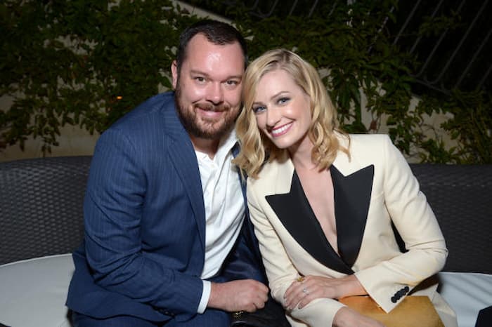 Michael Gladis together with his wife Beth Behrs